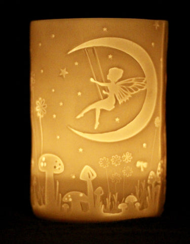 trapped fairies on a porcelain tealight holder by stefstorey £15