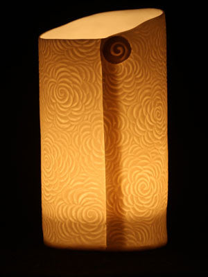 Rose carved porcelain tealight holder by stef storey £15 indoor and outdoor lighting
